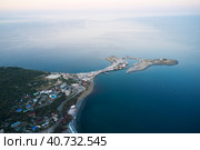 Panoramic view of the sea shoreline of Bolshoi Utrish village, cape with transition to a small island. Shot from a drone. Стоковое фото, фотограф Роман Дзюбало / Фотобанк Лори
