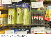 Finland, Imatra 12,05,2015 Spoons and floats for fishing on sale in a supermarket. Редакционное фото, фотограф Анна Кривицкая / Фотобанк Лори