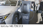 12 MAY 2023, Lisbon, Portugal: Electric car Show in International Fair of Lisbon - Lexus smart charger. Редакционное видео, видеограф Константин Шишкин / Фотобанк Лори