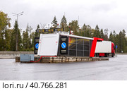 Контейнерная заправка на платной дороге ЦКАД (2022 год). Редакционное фото, фотограф FotograFF / Фотобанк Лори