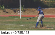 14 may 2023, Athletic stadium of Sobreda, Lisbon, Portugal: Baseball competition - White Sharks Almada Esen and Leones - the player hits the ball in slow motion. Редакционное видео, видеограф Константин Шишкин / Фотобанк Лори