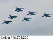 KUBINKA, RUSSIA - AUGUST 20, 2022: Aerobatic group "Russian vityazi" perform demonstration flight on the international military-technical forum Army-2022. Kubinka, Moscow region. Редакционное фото, фотограф Виктор Карасев / Фотобанк Лори