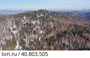 Горный Алтай зимой: хребет Иолго. Вид с воздуха. Altai mountains in winter: Iolgo Ridge. Aerial view. Стоковое видео, видеограф Евгений Романов / Фотобанк Лори