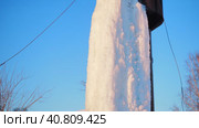 Water supply. A frozen waterfall from a water tower in a locality. Siberia. Hand held. Стоковое видео, видеограф Сергей Медведев / Фотобанк Лори