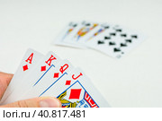 Playing cards in poker. One card more - will be an Royal Flush. Стоковое фото, фотограф Igor Tichonow / Фотобанк Лори