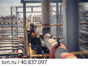 Manual arc welding of pipelines on an open site. Стоковое фото, фотограф Сергей Сергеев / Фотобанк Лори
