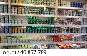 Yogurts on a shelf in a supermarket during the coronavirus epidemic (2020 год). Редакционное фото, фотограф Анна Кривицкая / Фотобанк Лори
