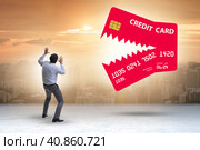 Businessman in credit card debt concept. Стоковое фото, фотограф Elnur / Фотобанк Лори