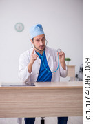 Young male doctor working in the clinic. Стоковое фото, фотограф Elnur / Фотобанк Лори