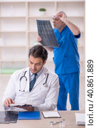 Two male doctors radiologists working in the clinic. Стоковое фото, фотограф Elnur / Фотобанк Лори