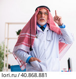 Old male arab doctor working in the clinic. Стоковое фото, фотограф Elnur / Фотобанк Лори