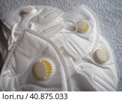 KN95 masks. Respirator, practical personal protective equipment. Several layers of the mask perfectly clean the inhaled air and effectively protect the respiratory tract from infection. Стоковое фото, фотограф Юлия Петровская / Фотобанк Лори