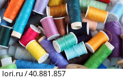 Reels with colored threads for sewing and needlework rotate. Subjects for hobby creativity and handmade. Стоковое видео, видеограф Глущенко Елена / Фотобанк Лори