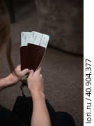 Closing a person with passports and boarding pass at the airport. Стоковое фото, фотограф Вербицкая Светлана / Фотобанк Лори