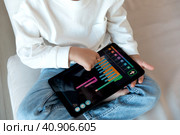A preschool kid programmer coding at tablet pc, uses machine language. Стоковое фото, фотограф Юлия Паутова / Фотобанк Лори