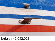 Fragment of the fuselage of a vintage aircraft. Colorful metal texture background with cracked paint. Destruction of a paint and varnish covering from influence of environment. American flag colors. Стоковое фото, фотограф Алексей Игнатов / Фотобанк Лори