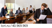 Sad middle aged white brunette businessman being reprimanded and fired. Стоковое фото, фотограф Яков Филимонов / Фотобанк Лори