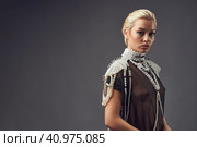 Beautiful woman warrior in pearl armor and transparent shirt. Стоковое фото, фотограф Гурьянов Андрей / Фотобанк Лори