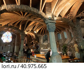 Interior view of Crypt of Colonia Guell with some tourists present (2022 год). Редакционное фото, фотограф Яков Филимонов / Фотобанк Лори