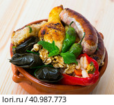 Kapama a dish of bulgarian cuisine with assortiment meat, grape rolls. Стоковое фото, фотограф Яков Филимонов / Фотобанк Лори