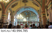 Lacarak, Serbia, 08.05.23 Divine service in the temple dedicated to the worship of God. Christian Orthodox Service. Singing prayers, reading the Holy Scriptures, performing the sacraments and rituals. (2017 год). Редакционное видео, видеограф Юлия Петровская / Фотобанк Лори