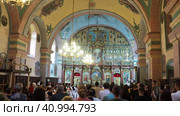 Lacarak, Serbia, 08.05.23 Divine service in the temple dedicated to the worship of God. Christian Orthodox Service. Singing prayers, reading the Holy Scriptures, performing the sacraments and rituals. (2017 год). Редакционное видео, видеограф Юлия Петровская / Фотобанк Лори