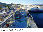 Terminal for loading gas onto ships. LNG equipment near sea Port terminal. Berth for unloading liquefied gas. Supply of liquefied gas. Стоковое фото, фотограф Ирина Старикова / Фотобанк Лори