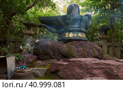 The methal Shiva Linga in Toganji temple. Nagoya. Japan (2019 год). Редакционное фото, фотограф Сергей Пристяжнюк (Serg Zastavkin) / Фотобанк Лори