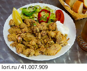 Chipirones battered fried baby squid. Стоковое фото, фотограф Яков Филимонов / Фотобанк Лори