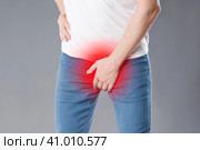 Pain in prostate, man suffering from prostatitis or from a venereal disease. Стоковое фото, фотограф Станислав Тарко / Фотобанк Лори