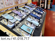 Moscow, Russia - Aug 14. 2023. Huawei phone in Mvideo shop of electronics and home appliances in Zelenograd. Редакционное фото, фотограф Володина Ольга / Фотобанк Лори