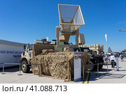 BERLIN, GERMANY - JUNE 23, 2022: The radiation gun HPEM SkyWolf for neutralizing drones as part of the IRIS-T SL anti-missile system by Diehl Defense. Exhibition ILA Berlin Air Show 2022. Редакционное фото, фотограф Sergey Kohl / Фотобанк Лори