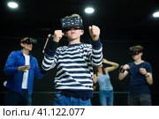 Boy child playfully poses in virtual reality glasses. Стоковое фото, фотограф Яков Филимонов / Фотобанк Лори