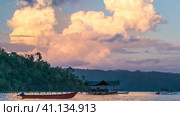Huge White Clouds above Diving Station on Sunset, Homestay Gam Island, West Papuan, Raja Ampat, Indonesia (2016 год). Стоковое фото, фотограф Igor Tichonow / Фотобанк Лори