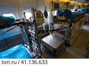 BERLIN, GERMANY - APRIL 25, 2018: Interior of the salon for evacuation and first aid to the wounded of transport Airbus A310-900 MRTT MedEvac "Hermann Kohl". German Air Force. Exhibition ILA Berlin Air Show 2018. Редакционное фото, фотограф Sergey Kohl / Фотобанк Лори