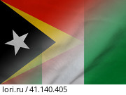 East Timor and Nigeria official flag transborder relations NGA. Стоковая иллюстрация, иллюстратор Кабак Дмитрий / Фотобанк Лори
