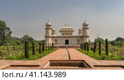 Beautiful marble tomb of Itmad-Ud-Daulah against the blue sky. Symmetrical mausoleum with domes, minarets, arches. There are ornaments on the walls, inlaid with precious stones. India. Agra (2022 год). Стоковое фото, фотограф Вера Ивановна Кубарева / Фотобанк Лори