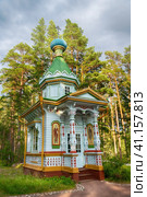 Konevets Island, Russia - 22 July 2023: Chapel of the Assumption of the Mother of God, wooden structure of 1899. Редакционное фото, фотограф Оксана Медведева / Фотобанк Лори