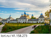 Konevets, Russia July 22, 2023. Konevsky Monastery on Konevets Island on Lake Ladoga - Russia. The central entrance with the gate church on the zakta in the sunlight. Редакционное фото, фотограф Оксана Медведева / Фотобанк Лори