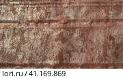 Rusty iron or alloy with special gloss, ductility, good thermal conductivity and electrical conductivity. Corrosion of metal. Metal fence or scrap metal. Brown and red rust. Recovery. Стоковое фото, фотограф Юлия Петровская / Фотобанк Лори