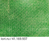 texture of fluted rusty iron metal plate background. Corrugated metal plate in green. Steel or iron metal profile. Стоковое фото, фотограф Юлия Петровская / Фотобанк Лори