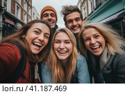 A group of friends laughing in the street. Стоковое AI-изображение, AI-художник Поликарпов Владимир Владимирович / Фотобанк Лори