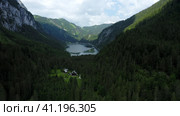 Aerial fly towards Dachstein mountain and Hinterer Gosausee lake inUpper Austria. Стоковое фото, фотограф Igor Tichonow / Фотобанк Лори