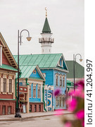 Kayuma Nasyri Street. Staro-Tatarskaya Sloboda. Al-Marjani Mosque. Summer day. Russia, September 2023. The Republic of Tatarstan. Kazan. Редакционное фото, фотограф Photojuli / Фотобанк Лори