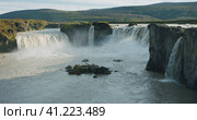 Beautiful Godafoss waterfall in sunset scene, Iceland. Стоковое видео, видеограф Igor Tichonow / Фотобанк Лори