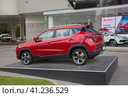 Автомобиль "Москвич 3" 2023 года выпуска около автосалона на Олимпийском проспекте в Москве, Россия. Редакционное фото, фотограф Елена Коромыслова / Фотобанк Лори