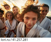 A group of teenage wrestlers in a kimono. Стоковое AI-изображение, AI-художник Кирилл Черезов / Фотобанк Лори