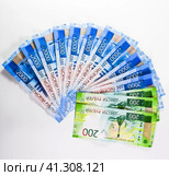 Russian new denominations of 2000 and 200 rubles. Russian banknotes. Russian money is ruble. Стоковое фото, фотограф Леонид Еремейчук / Фотобанк Лори