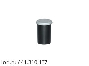 Black plastic film case with grey cap. Body for the photo film. Isolated on white background. Футляр из черной пластиковой пленки с серой крышкой. Корпус для фотопленки. Изолированный на белом фоне. Стоковое фото, фотограф Дмитрий Березнев / Фотобанк Лори