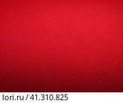 The background is red or scarlet. A beautiful festive heterogeneous textured background with specks, dots, veins, fibers, relief and other textures. Gradient change in color and awareness. Copy space. Стоковое AI-изображение, AI-художник Юлия Петровская / Фотобанк Лори